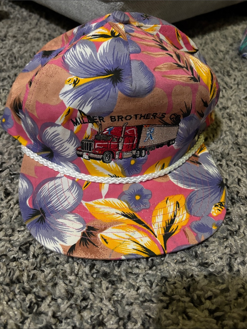 Floral Miller Brothers Co. Trucker Hat with Embroidered Semi Truck